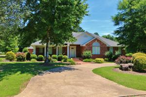 Lions Den Golf Community.You'll want to take a closer look at this traditional brick home located in Bay Meadows Subdivision. Take advantage of the numerous updates including wood flooring, granite counter tops stainless appliances and fresh paint. Entertaining is a must in the formal dining area & eat in kitchen. Stay cozy with the wood burning fireplace ducted through out. Spacious master