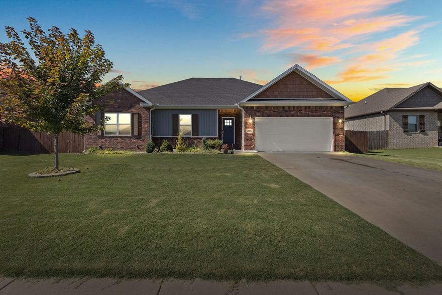 Qualifies for $0 down! Just 9 miles from the University of Arkansas sits this adorable 4 bedroom home in the Hallmark-esque town of Prairie Grove. Enjoy the remaining days of summer in the fully fenced backyard or savor your morning coffee on the covered back patio. The interior boasts a split floor plan, with a spacious primary suite overlooking the backyard. The bright & open kitchen has stainless steel appliances, granite counters, pantry, & lazy susan! The open-concept living is nestled around the gas fireplace & flows to the eat-in kitchen. And while the home packs a big punch-- you will LOVE what the solar panels bring to your budget...owner has had $0 electric bills over the last 12 months! Enjoy the savings while cozied up this winter around the fireplace! Have a green thumb? You'll love the established garden beds, mature landscaping & ornamental trees! If you thought the days of 3.25% rates were gone, this home is eligible for a 3.25% VA assumable loan (must qualify). Fridge/washer/dryer all convey!