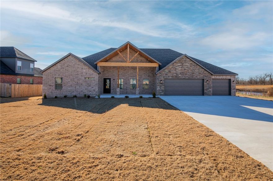 Welcome to 1951 Lordsburg Court, a stunning 4-bed, 2.5-bath home nestled on a nearly half-acre lot. As you step inside, you’ll notice the bright, open floor plan & high-end finishes throughout. The spacious living room includes a cozy fireplace, wood beams, & natural light. The kitchen comes complete with a large center island, quartz countertops, stainless steel appliances, & ample cabinetry. The split floor plan ensures privacy, with the master suite tucked away for ultimate tranquility. The master bath includes a soaker tub built into a large walk-in shower with both a rainfall & regular showerhead. The master suite also boasts a generous walk-in closet with built-in vanity for added convenience. Outside, the large covered porch provides an ideal spot to unwind. Additional features of the home include a 3-car garage. Situated in a sought-after neighborhood with easy access to Bentonville's top-rated schools, parks, dining, & shopping, don’t miss the chance to make this exceptional home yours!