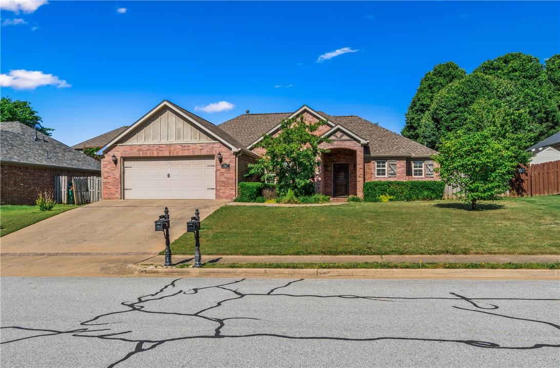 Location, Location, Location! Enjoy all of the benefits of Bentonville(5 min), Rogers (20 min), and Fayetteville (40 min) without the traffic and noise nearby. Also, a short walk down the road to a beautiful mini lake and park. This stunning 3-bedroom, 2 bathroom, plus a large office, is located in Sienna Estates, a lovely community with a clubhouse, pool, and fitness room! Enjoy a quiet street with blazing fast fiber internet, a fruit tree in your front yard that produces delicious fruit each year. Also, new appliances, a refrigerator, a dishwasher, and nice garage shelving. The house is professionally landscaped in the front and backyard. Whether you are looking to be close to Walmart Corporate or want to raise your children in an area with great schools, this is an excellent home to settle into.