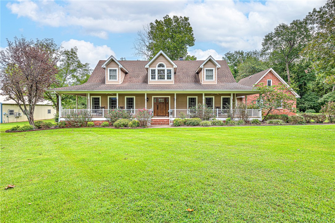 Custom built craftsman style home nestled on 2.5 acres with wrap around porch and large back deck. This beautiful home is open, spacious, and perfect for everyday living or entertaining. Kitchen features granite countertops, stainless steel appliances, double oven, and abundant cabinetry. This 3400 sqft home has 4 bedrooms and 2.5 baths, formal dining, breakfast room, sunroom, and more. Included is a 240 sqft shop remodeled for a tanning salon, but could be perfect for an office. It has electricity and 2 wall heat/air units.