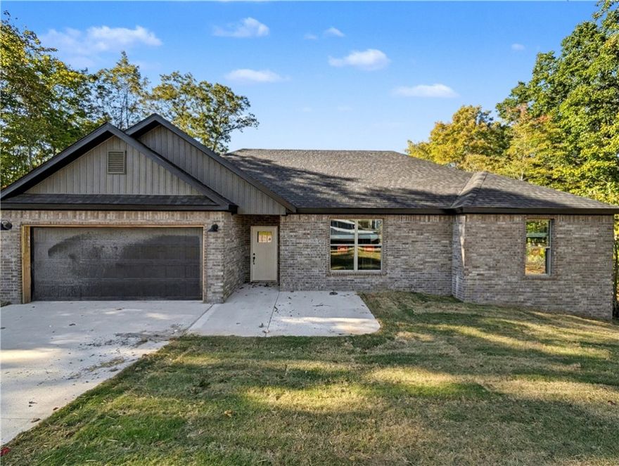 Welcome To Your Next Home! Tucked Into A Prime Spot In Bella Vista With Easy Access To 71B, Lake Ann, And Some Of The Best Mountain Bike Trails Around—This One’s Got The Vibe And The Location. Step Inside To 9 Ft Ceilings, A Wide-Open Living Area Offering Easy Furniture Placement, And A Corner Fireplace. The Kitchen Is A Total Win With Custom Cabinets, Granite Counters, Tile Backsplash, Under-Cab Lighting, Pantry, Island Seating, And Eat-in Dining. The Primary Suite Delivers A Walk-In Closet Built For Real-Life Storage Goals, And A Soaker Tub, Tile Shower, Dual Vanity In Primary Bath. Two Additional Rooms And A Full Hall Bath With Double Vanity Round Out The Floorplan. Out Back, You’ve Got A Covered Deck That Steps Down To A Sodded Yard Ready For Whatever You've Got Planned. Deeded As A 2-Bed Septic. 3rd Room To Be Considered Office/Bonus/Other Non-Sleeping Room. Signed Agreement Required.