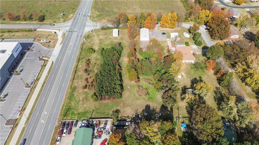 Prime commercial opportunity in one of Northwest Arkansas’ fastest-growing corridors. Located just off I-49 at 626 Oakwood St in Lowell, this level and build-ready parcel offers excellent visibility and easyaccess for a variety of business uses. Surrounded by established commercial development, distributioncenters, and residential neighborhoods, the location provides strong traffic flow and consistent growthmomentum. Whether you’re looking to develop office, retail, service-based business, or investmentproperty, this site offers the flexibility to bring your plans to life. Utilities available. Close proximity to JBHunt headquarters, restaurants, hotel accommodations, and key regional business hubs. A strategiclocation in the heart of NWA’s economic expansion. Bring your vision and build where the growth is happening