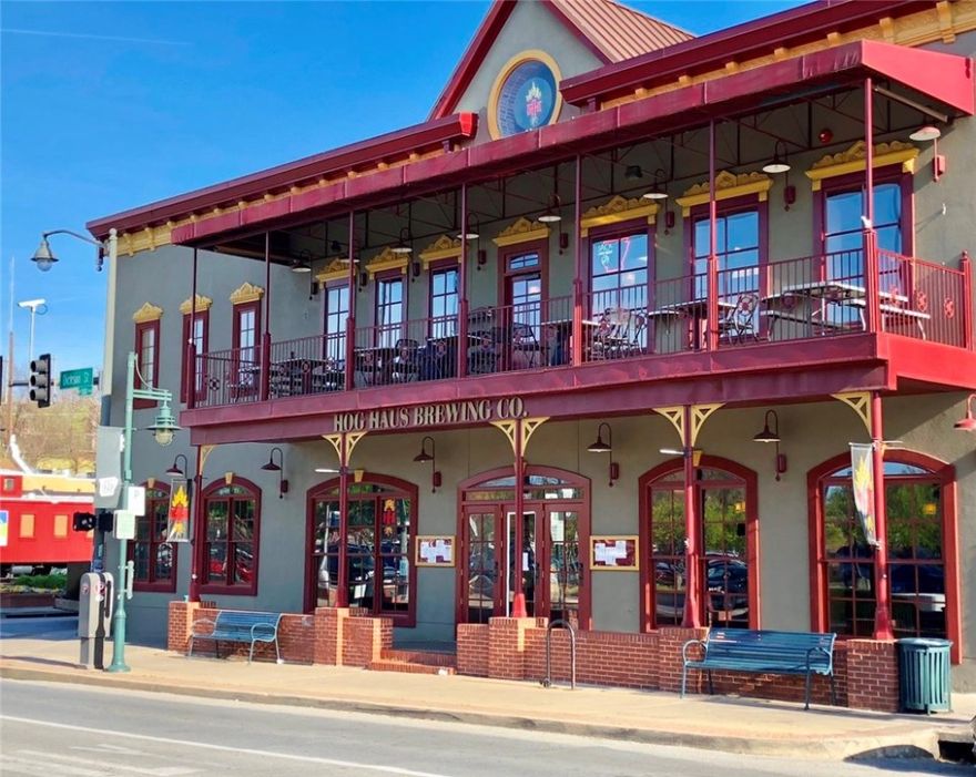 One of the most premier locations in Fayetteville is now available. This building is one of the most visible and successful in the Dickson St entertainment district located at the corner of Dickson and West directly across from the Walton Arts Center. With 2 commercial kitchens and a large scale brewery, this opportunity will not come around often.
