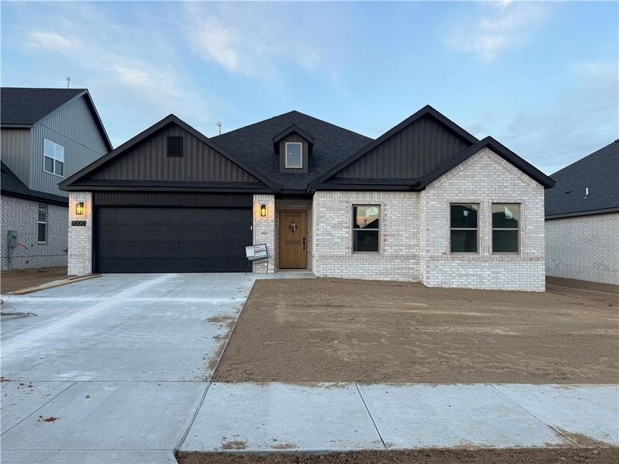 Builder is offering up to $7,500 towards closing costs, interest rate buy down or towards an appliance package! The "ROSS" plan boasts a spacious single story open-concept layout with luxurious finishes including vaulted ceilings, quartz countertops, inviting entry way, upgraded lighting fixtures, custom cabinets, black stainless steel appliances, gas fireplace, gas range, oversized tiled walk in shower in primary bathroom with rainfall shower head & luxury vinyl plank floors throughout. Enjoy standard inclusions such as insulated garages, full home gutters, privacy fence, & 2” blinds throughout. Community pool coming in Phase 2! Under 10 minutes to XNA Airport and under 20 minutes to Downtown Bentonville and New Walmart Campus. Photos are sample photos only. South Facing!