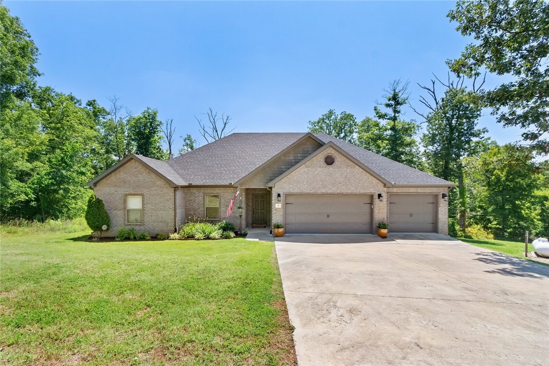 Come see this great home in a sweet location. Built in 2017, a .41 acre lot that sits in a quiet cul-de-sac with a backyard that gives you that secluded feel you have been looking for! This property also has hidden walking trails behind the house, it is close to trails and all that Bella Vista has to offer. A must see!!