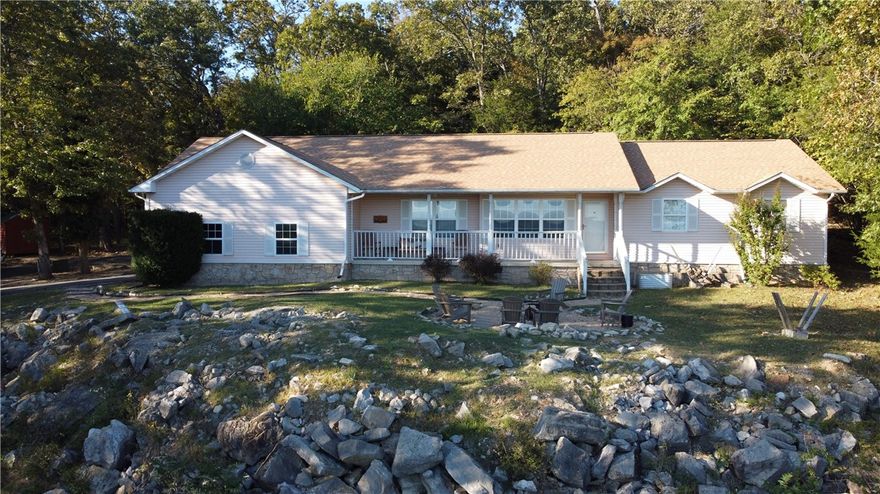Ozark Mountain Views and less than 3 miles to the Buffalo National River Park.  This private home comes fully furnished with 6 BR, 3 BA, 3,411 SQFT, 2 car garage, and sits on 5.86 Acres M/L.  The property features a covered porch, gas fireplace, tankless gas water heater, finished basement, asphalt driveway, 8 x 12 storage building, and so much more.  Would make a great nightly rental.  This is a must see property.