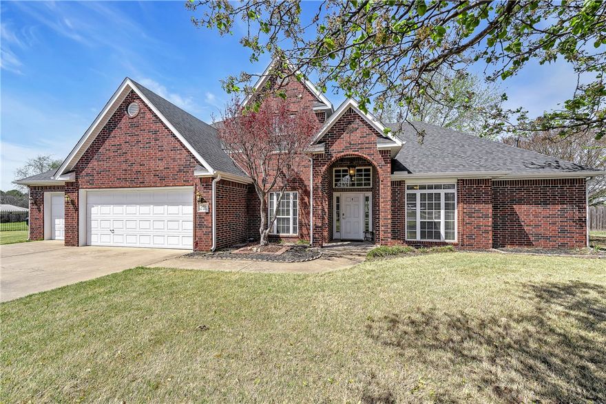 Welcome to 505 Elk Dr in Elm Springs — a beautifully maintained 4-bedroom, 2.5-bath traditional home nestled on 1.11 acres in the quiet, established Oak Ridge Estates. With 2,875 sq ft of thoughtfully designed living space, this home features the primary suite and a private office on the main level, while three additional bedrooms and a full bath round out the upper floor. The stunning double-sided fireplace connects the kitchen and family room, creating a warm, inviting heart of the home. Brand new kitchen appliances, a new roof and gutters, and a new 5-ton HVAC mean the big-ticket items are already done. A 3-car garage, granite counters, wet bar, and generous storage complete the package. Situated on a cul-de-sac with one of the largest lots in the neighborhood, you're just minutes from Lake Elmdale and I-49. This one checks every box — space, updates, location, and value at $650,000.