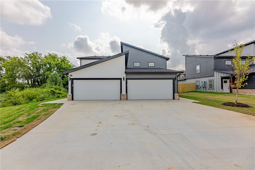 Unique and modern best describe these 3 bed 2.5 bath Brand New Construction Duplexes in SW Bentonville. Lots of amenities that include quartz counter tops, luxury vinyl Plank flooring throughout, 2" faux wood blinds, upstairs study nook, ALL appliances, private covered back patio and more. Walking distance to Bentonville's newest Creekside Park, a 35-acre community park, with regulation cricket field, pickleball courts, evening-lit dog park, splash pad, playground and passive recreation space with a group pavilion. Close to everything Bentonville has to offer. Reserve yours today before they are gone! **Pictures may not be of exact unit**