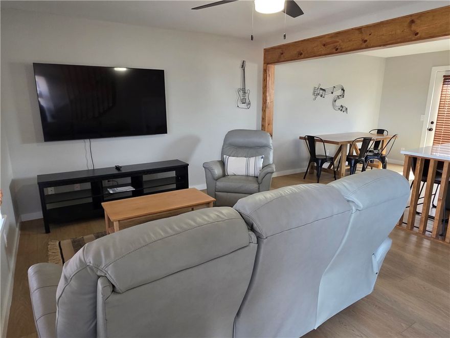 Recently updated luxury townhome ideally located on Moberly Ln between SE 8th St and SE 5th St, only 4 blocks from the new Walmart Home Office, 5 min to Downtown Bentonville Square, and quick access to I-49. This modern residence is furnished and features stylish finishes, open-concept design, and included appliances — washer, dryer, and refrigerator — making turnkey move-in effortless. Enjoy the convenience of low-maintenance living plus access to an on-site multi-purpose sports court for recreation and community connection. Location, lifestyle, and luxury — all in one exceptional opportunity.