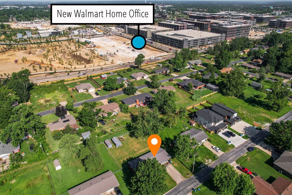 Great investment opportunity in the middle of all things Bentonville. Directly behind new Walmart campus. Quick access to I-49. Could be split into two lots for townhomes like other lots on the street have done. No lockbox present for interior showings. Cross-posted, See also LND Listing MLS# 1318468