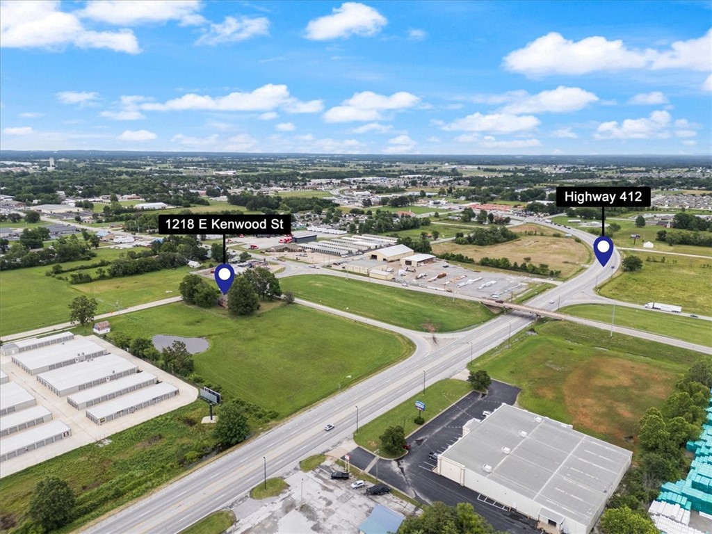 5 Acres w/ Hwy 412 Frontage & Development Potential! Incredible opportunity to own 5 flat, usable acres feat approx 400 feet of Hwy 412 frontage and extending over 600 feet deep to E. Kenwood Street. Property offers potential access from 3 sides, making it an ideal site for future commercial development. Currently zoned residential/agricultural, the land includes a well-maintained home built in the late 1970s—livable and ready for use as a monthly or nightly rental. Property is level with proper drainage and utilities available at the street. Key Highlights: Hwy 412 visibility & frontage (~400 ft);
Possible access from Hwy 412, E. Kenwood St, and access road to Highway 412; Zoned Residential/Agricultural with strong commercial potential; Home on site is in good condition; Approx. 1 mile from Oklahoma line & Cherokee Casino; 2 miles from new WOKA Whitewater Park; 25 miles to I-49 in Springdale. Excellent location for investment, income, or development. See also Com listing ML# 1312226 & RES listing #1312212