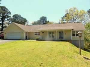 Room for the big family! 5 bedroom, 3 1/2 bath home on 1 acre. Many extras including, hardwood floors, 2 gas log fireplaces, 4-car garage, deck 1 patio & large covered front porch. Nice Kit. w/lots of oak cabinets, brkfst bar & pantry. Walk-in closet in Mstr BR. Den & large Rec. Rm in bsmnt. Private setting in cul-de-sac. Near Branson, Harrison & several lakes.