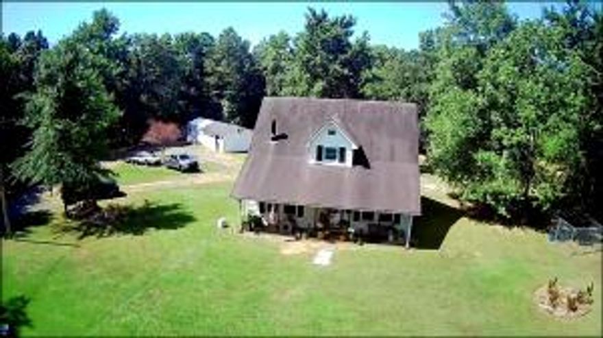 Are you looking for seclusion? Are you looking for a get away? Are you looking for a home with acreage?  If you answered yes to any of these questions, then look no further and check out this cute 2 story home with 10 acres. 2 bedroom 2 bath with a detached mancave. There is also a newer storage building. When you're ready to relax you will enjoy the patio area off the back of the home. You will have mountain views to the front and the wooded acreage to the back. Windows are new and  all appliances will convey with the exception of the washer and dryer.