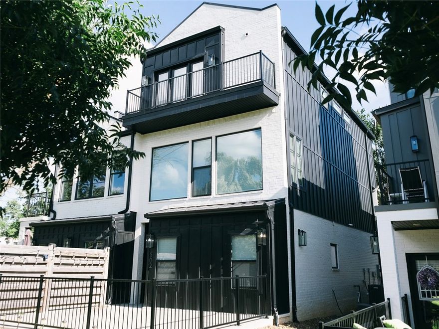 Welcome to Downtown Bentonville! This modern 3-story townhome is perfectly situated on the greenway, equidistant from the Bentonville Square and the Walmart Home Office. The first floor offers a private guest suite with en suite bath, a welcoming entry foyer, and an attached garage. The second level features an open-concept living and dining area, a sleek kitchen, powder bath, and a covered outdoor sitting area—ideal for outdoor grilling and dining. On the third floor, you'll find a spacious primary suite, an additional guest bedroom with full bath, and a versatile bonus room perfect for a media room, home office, or gym. Welcome to Bentonville’s most walkable and vibrant neighborhoods!