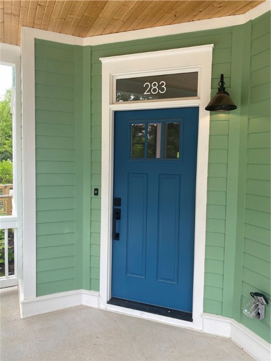 Welcome to the 11th Street Cottages, a thoughtfully designed new community centered around lush private gardens, just two blocks east of Walker Park and the Razorback Greenway. You're so close to Fayetteville’s vibrant downtown square and UofA.  This spacious floor plan offers a bright, open-concept layout with a large living area and a modern kitchen featuring ample prep space, high-end cabinetry, and a central island with bar seating for casual meals or entertaining. With primary suites and laundry connections on both levels, the flexible design supports a variety of living arrangements. Enjoy large bedrooms, walk-in closets, and spa-like bathrooms with quality finishes. A versatile upstairs bonus room is perfect for a home office, nursery, or lounge. Built for comfort and sustainability, the home includes ENERGY STAR high-performance systems for low utility costs, healthy indoor air, and year-round efficiency. Unwind on your private deck or connect with neighbors in the beautifully landscaped shared garden.