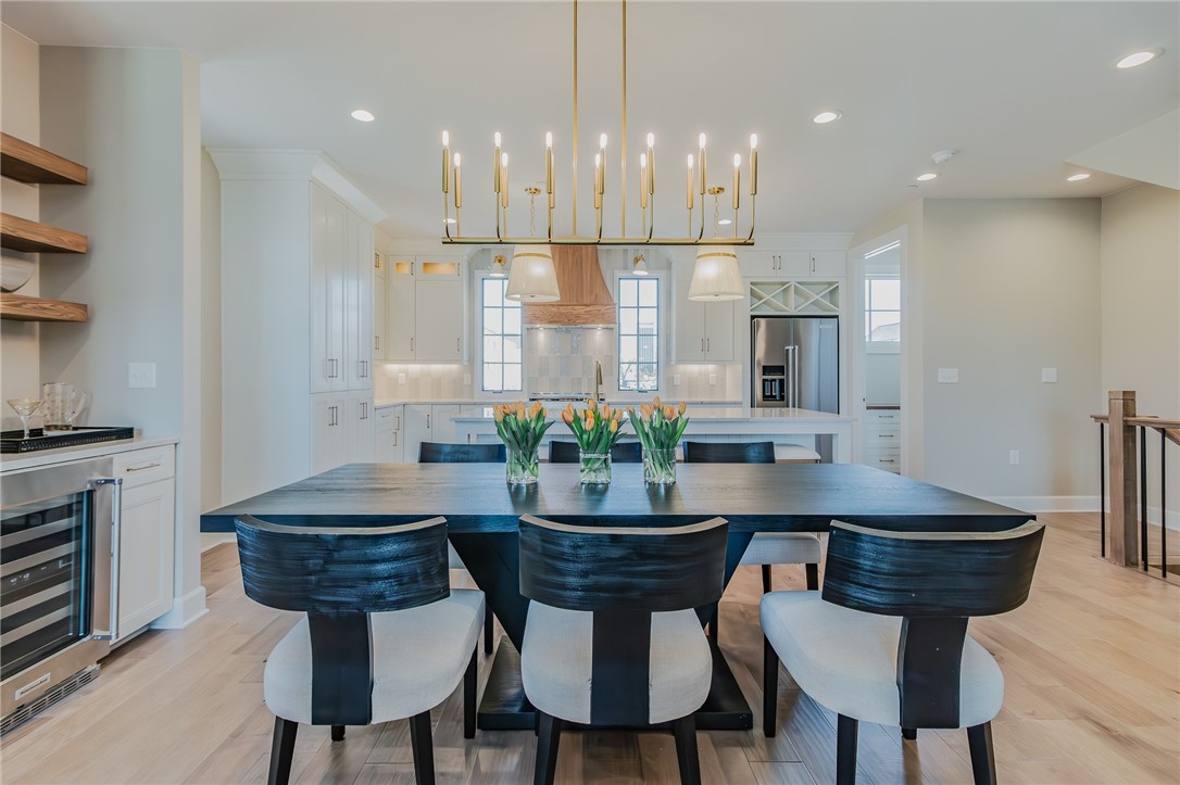 This is the current Model Home for the Brownstone development! Located on Pauline Whitaker Parkway this new construction brownstone situated in the heart of Pinnacle’s urban living. The tastefully composed three bedroom, three-and-a-half baths with open concept living and entertaining spaces. The great room exhibits large windows that open to the gorgeous sunset over Pinnacle Country Club. The gourmet kitchen features a statement island and high-end appliances and finishes. The light filled primary suite offers a walk-in closet, and a spa like bath with a wet room. Located in Rogers' newest community, with Pinnacle Heights retail, entertainment, and dining mecca just a stroll away. Property taxes estimated based on land only.