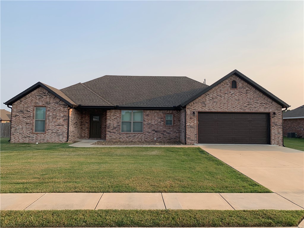 This all brick home has an open floor plan with vaulted kitchen-living room. Granite counters throughout with custom cabinetry. French doors open to a large covered back porch. Master suite has whirlpool tub with tiled shower and walk-in closet. Oversized garage with room for a workbench and lots of attic storage.