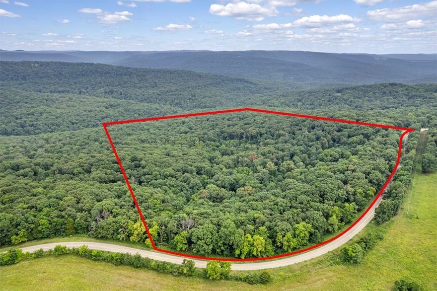 Experience the perfect blend of privacy and convenience on these 2 parcels totaling 46.5 acres. Just a few minutes off of 49 at the Winslow Exit and only a mile north of the Devils Den State park entrance. Ideal for building your dream home or just using for a weekend hunting or camping oasis. There is a mobile home on site that is currently being occupied, but would make a great weekend cabin or a full time residence with a little TLC Surrounded by nature, the property features a wet weather creek at the bottom. The property has a well and septic in place, and rural water and Tap is available at the road. Beautiful Arkansas forestry and views of the Boston mountains the serenity and seclusion are just 20 minutes from Fayetteville. Contact Agent for Showing Instructions.  Also see Alternate Land Listing MLS 1314987