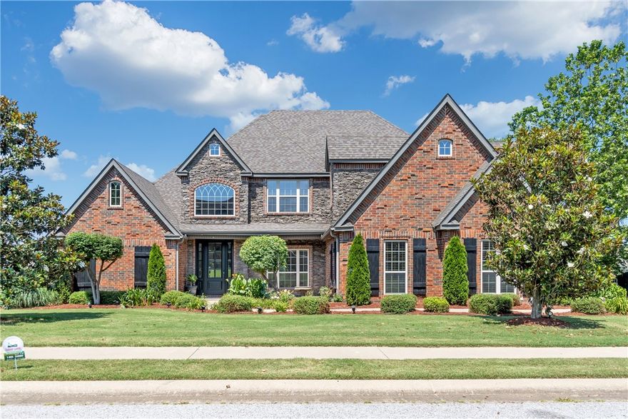 Welcome to this elegant 4-bedroom, 3.5-bathroom residence, perfectly situated in the sought-after Vandergriff/McNair school district. Spanning 3,900 sqft, this luxurious home features a grand entryway that leads to a formal dining room and a spacious living room with a custom fireplace mantle, built-in bookshelves, and impressive floor-to-ceiling windows showcasing serene backyard views. The gourmet kitchen is a chef’s dream with double ovens, a large island, stainless steel appliances, and stunning Brazilian Cherry Cabinets. Enjoy the warmth of wood flooring, the elegance of tall vaulted ceilings, and the comfort of three gas log fireplaces throughout. Upstairs, the bedrooms boast walk-in closets, an office and two full baths. The exquisite primary suite offers a fireplace and a luxurious bath complete with a walk-in closet, shower, soaking tub, and dual vanity. Step outside to a newly updated and painted wood deck, ideal for relaxation, overlooking a tranquil pond and beautifully landscaped garden.