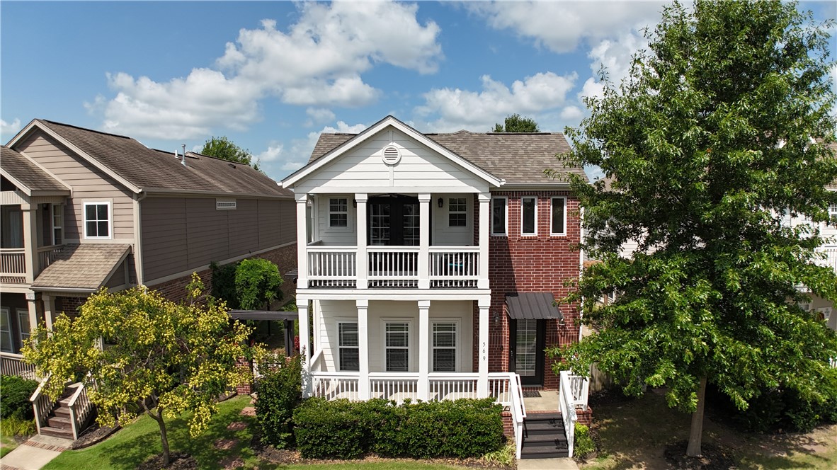 AirBnB approved-permit through Oct 25! Freshly painted exterior & beautifully maintained, this 3bd, 2.5ba townhome is in a popular subdivision. Updates include-wood floors, roof 2024, wtr heater 2023, garb disposal 2025, oversized insulated 2-car grg door, SS appliances. Interior & exterior motors replaced in HVAC units-2023/2024. Open floor plan downstairs w/ ½ bath & office area. Fireplace in LR. Bedrooms upstairs. Primary has a private balcony, walk-in closet, dual sinks, jacuzzi tub, & shower. Guest bedrooms share a Jack n Jill bath, large closets, & Juliet balconies. French doors lead to a pergola-covered patio to enjoy flowers, landscaping, & privacy. Walking path w/borders added for access to side yard. POA covers lawn mowing, maintenance including front flower beds, weeding, trimming & mulching. Smart home controlled by app-ring doorbell, side camera, thermostat, door lock, garage opener, & sprinklers. Buyers to satisfy themselves on SF. Close to UofA campus. Razorback Transit picks up nearby on Rupple Row.