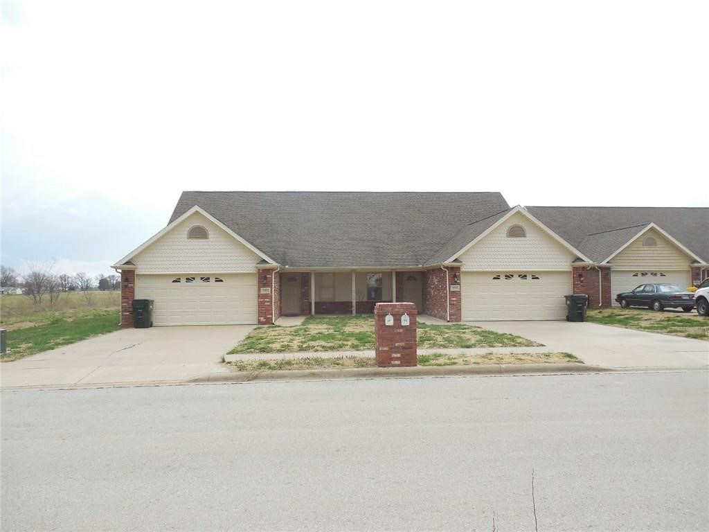 *****Move In Special! $200 off first months rent for any lease signed by December 31***** Only 10 minutes from the New Bella Vista Bypass. This beautiful duplex features four large rooms with two and a half bathrooms. As you walk in you are greeted with a spacious living room that will make you feel at home, with its fenced in back yard which gives you great outdoor space to relax and entertain. The kitchen has every thing you need with an glass top range, over the range microwave. This lovely unit also has a two car garage.