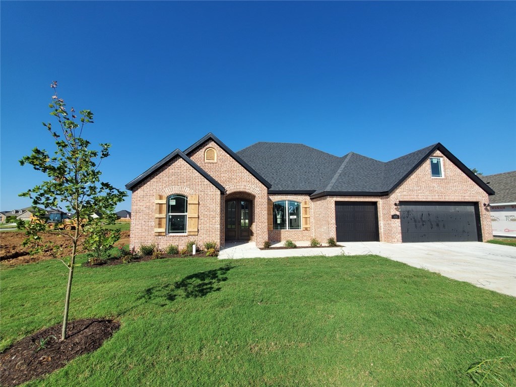 This Beautiful New Home boasts 3 Bedroom, formal office, 2.5 Bath, bonus room, 3 car garage, hand scraped hardwood flooring, granite counters, SS appliances, low E-windows, covered back porch, Sod & Landscape Pkg. Limited 1 YEAR Builders Warranty. Now is the time to pick interior colors for your new dream home. Photos are stock photos of F11055 Plan.