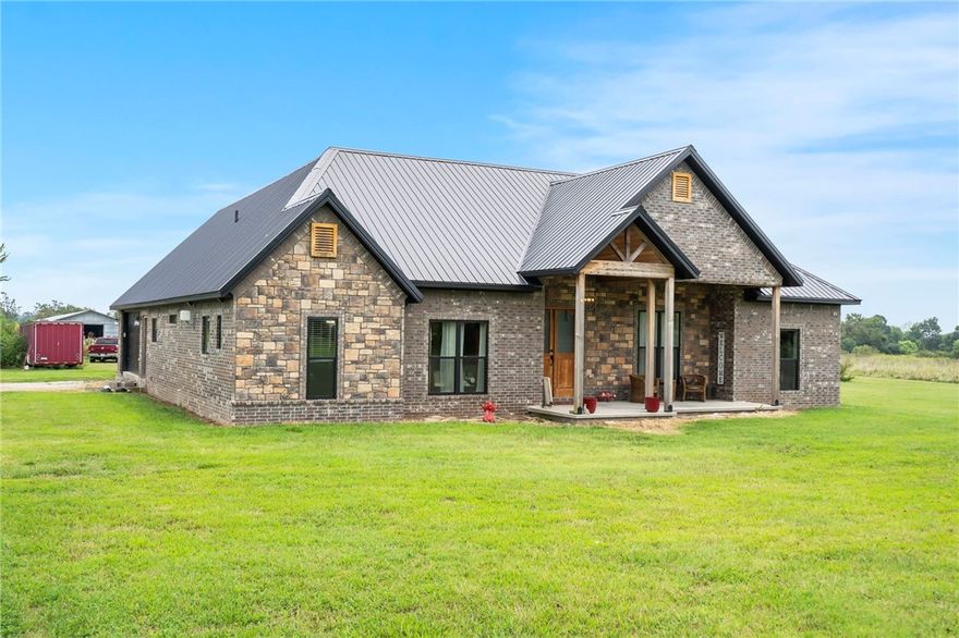 This unique property features a spacious 2,726 sq ft, 3-bedroom, 3-bath home with a bonus room, an oversized insulated shop, and six chicken houses, combining luxury living with rural charm. Alternatively, it presents an excellent development opportunity, with city utilities available on-site and convenient sewer access. The land’s strategic positioning—bordered by three roads—ensures easy access and maximizes development potential. Located just minutes from Grimsley Junior High School. Also listed as land under MLS# 1263540.