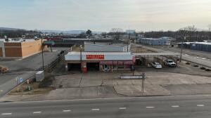Don't miss this incredible opportunity to own 8,000 square feet of commercial space on 1.13 acres in the heart of Russellville. Situated in a heavily traveled area, this property offers maximum visibility and accessibility, making it ideal for a variety of businesses, including retail, office, restaurant, medical, or redevelopment projects.With ample on-site parking, excellent frontage, and close proximity to major roads and highways, this property is perfectly positioned for success. Whether you're an investor or a business owner looking for a high-exposure location, this is a rare opportunity to secure prime commercial real estate in a growing market. VIEWING ONLY DURING BUSINESS HOURS