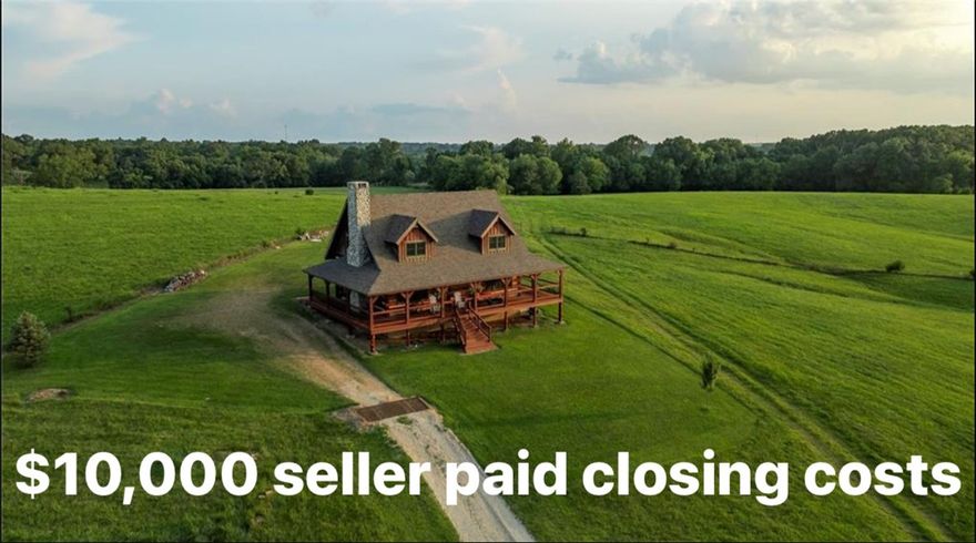 Discover the unparalleled beauty of Rising Sun Ranch and its charming 3- bedroom, 2-bath log cabin lodge, situated on 23 serene acres. Perched on a hill, this home offers breathtaking panoramic views of woodlands and rolling hills. The hand carved front door opens into a spacious living area featuring a grand stone Fireplace, soaring ceilings, and custom hand forged chandelier. The well- appointed kitchen includes modern appliances and rustic charm, perfect for both everyday meals and entertaining. The owners suite isa private oasis with an ensuite bath with heated floors and cozy, warm wood accents. Outside, enjoy a wraparound porch, ideal for drinking your morning coffee or evening relaxation while watching the abundant wildlife. Explore the vast property with its natural trails and peaceful seclusion. This lodge combines rustic elegance with modern comforts, providing a perfect escape from the hustle and bustle of city life. Embrace nature & tranquility at Rising Sun Ranch, your very own log cabin paradise.