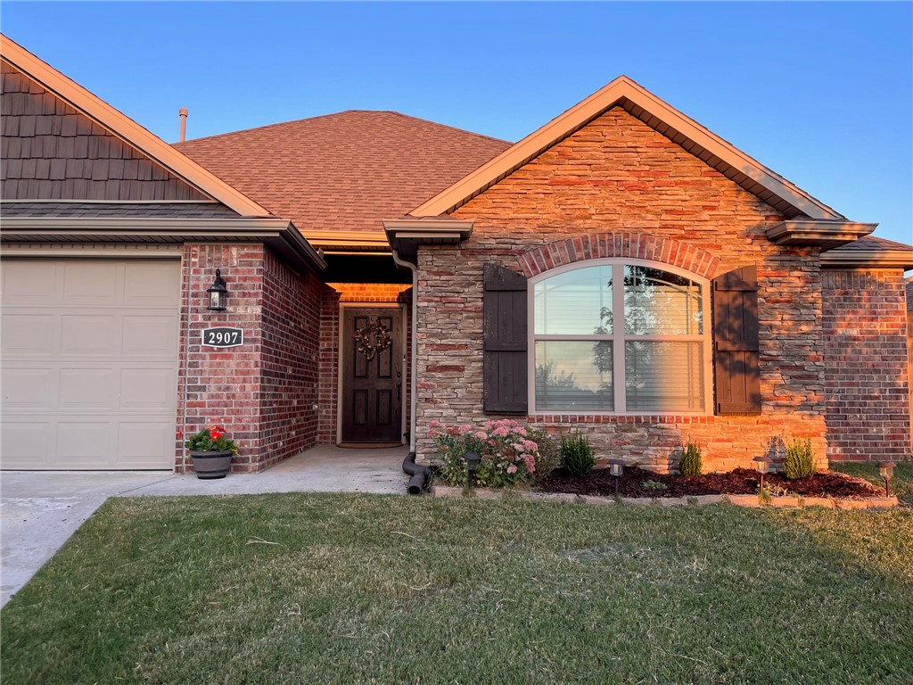 Great location! Come see this like new home, 1564 sq. ft., all brick, 3bed, 2 bath, split floor plan, includes custom features, pantry, granite kitchen counters, gas range, real wood floors, fireplace and stone accent on the exterior, plus covered porch and privacy fenced backyard. Must see!