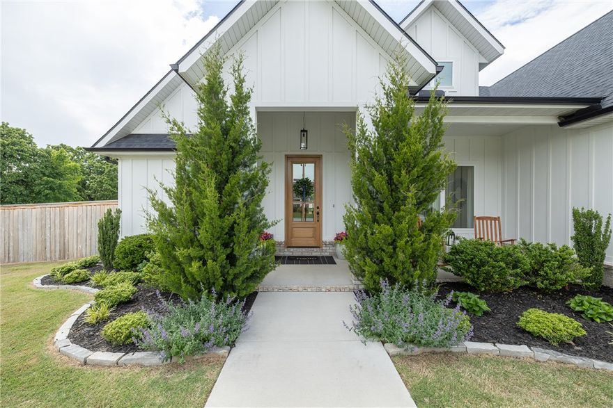 This beautiful custom home built by Austin Mayfield is a 4 BR. 3.5 bath located in East Fayetteville neighborhood, Blackberry Ridge has a country feel not far from town. Situated on a desirable corner lot, this stunning home features soaring vaulted ceilings, spacious living areas, and thoughtfully designed finishes throughout.  The well-landscaped yard and attractive privacy fence create a peaceful outdoor retreat perfect for relaxing or entertaining. Also septic is set off from the backyard so it could accomodate a private pool installation.  Combining elegance, comfort and curb appeal, this exceptional home offers luxury living in one of the area’s most desirable communities.