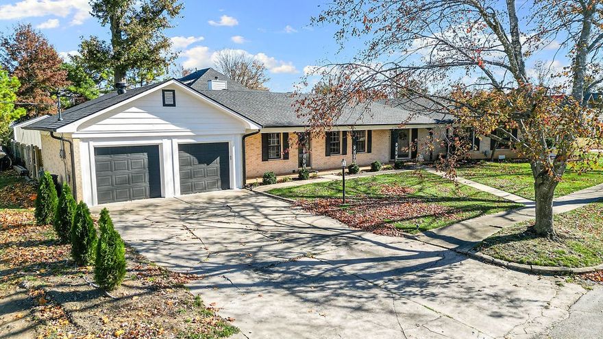 Situated on a corner lot, this beautifully maintained 1940s mid-century home with art deco accents is ideally located just minutes from downtown Rogers. The inviting 2 bed, 2 bath residence with over 2700sf features hardwood floors, traditional straight-line windows, plantation shutters, and an abundance of natural light throughout.  A spacious formal dining room, elegant foyer, and bright sunroom provide exceptional spaces for relaxing or entertaining. The custom utility room includes an Electrolux stackable W/D and a Frigidaire deep freeze—both to convey with an acceptable offer.