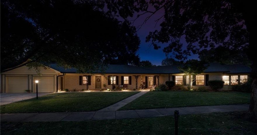 Situated on a corner lot, this beautifully maintained 1940s mid-century home with art deco accents is ideally located minutes from downtown Rogers. The inviting 2 bed, 2 bath residence with over 2700sf features hardwood floors, traditional straight-line windows, and an abundance of natural light throughout. The formal dining room, elegant foyer, and bright sunroom provide exceptional spaces for relaxing or entertaining. Custom utility room includes an Electrolux W/D and Frigidaire freezer; this room was originally a bedroom and could easily be converted back.  Detached Shed is perfect for your workshop!