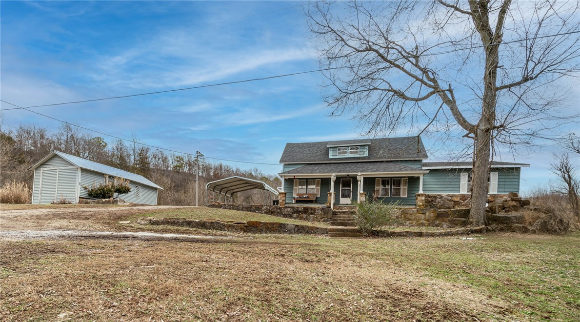 Quaint 4 bedroom, 1 bath home a bit off of Highway 21 South. This gem is situated on a creek that is fed by year-round spring on approximately .63 acres. Some of the flooring is original hardwood and with the recent remodel, some is wood vinyl. This includes a new well pump in June 2024 and new shingles in early 2024. Approximately 13 miles south of Berryville, you can go further towards Fayetteville/Springdale and back towards Green Forest and Harrison. You can travel the highways for adventure and views.