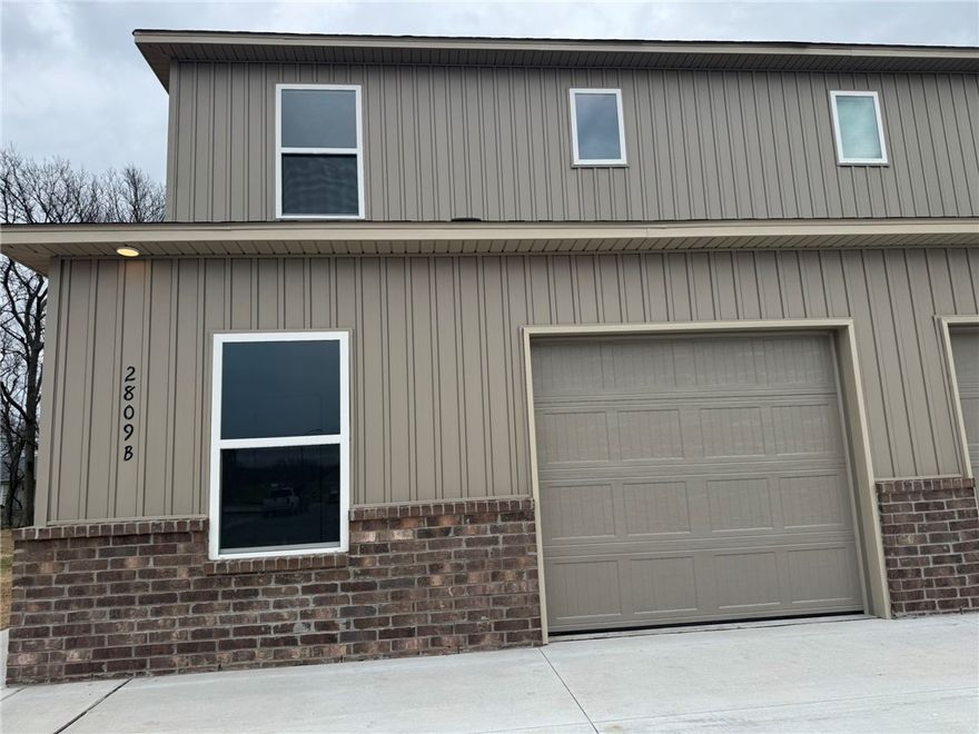 Introducing The Elmstead, a beautiful two-story duplex located in a vibrant, new community. This modern home offers 3 spacious bedrooms and 3 bathrooms, featuring a flexible layout that suits a variety of lifestyles. Upstairs, you'll find the serene master suite, complete with a private bathroom and ample closet space. An additional bedroom and bathroom are also located upstairs, providing comfort and privacy for family or guests. The lower level features a third bedroom with its own full bathroom, perfect for visitors, a home office, or a private retreat. The open-concept living area on the main floor is perfect for both relaxing and entertaining. The well-appointed kitchen includes modern appliances, generous counter space, and plenty of storage. With a one-car garage offering secure parking or extra storage, The Elmstead combines practicality with style. Situated in a brand-new community, this home is conveniently located near local amenities, parks, and schools. The Elmstead is the perfect place to call home.