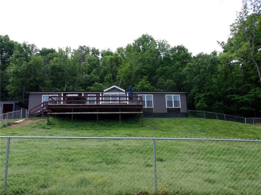 This 2019 Cavalier home sits on 3 spacious acres and offers 4 bedrooms and 2 bathrooms on a permanent foundation. The home feels like new and is move-in ready.
The kitchen is fully equipped for anyone who loves to cook, featuring a beautiful wood countertop, an eat-in dining area, and additional bar seating for convenience and entertaining.
Included with the home are the refrigerator, washer and dryer, a large safe, and outdoor patio furniture—making your transition even easier.
Outside, you’ll find excellent covered parking with a 22x31 detached carport and a 45x25 RV carport equipped with 30-amp (220) service and a 110 receptacle. There is also a 6x10 storm shelter for added safety.