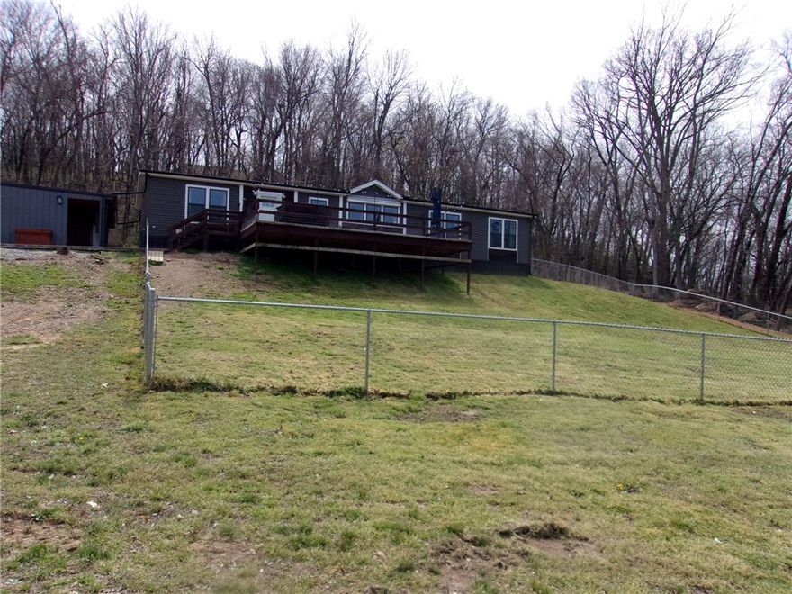 This 2019 Cavalier home sits on 3 spacious acres and offers 4 bedrooms and 2 bathrooms on a permanent foundation. The home feels like new and is move-in ready.
The kitchen is fully equipped for anyone who loves to cook, featuring a beautiful wood countertop, an eat-in dining area, and additional bar seating for convenience and entertaining.
Included with the home are the refrigerator, washer and dryer, a large safe, and outdoor patio furniture—making your transition even easier.
Outside, you’ll find excellent covered parking with a 22x31 detached carport and a 45x25 RV carport equipped with 30-amp (220) service and a 110 receptacle. There is also a 6x10 storm shelter for added safety.