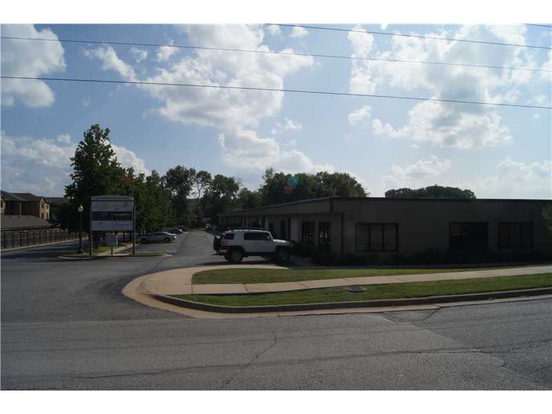 In the heart of everything with easy access to I-540. Perfect location for the Wal-Mart supplier within 15 min of home office. Next door to Village on the Creeks and access to resturants, gym and walking trails, hotels and 30 min to XNA. Can't beat it.,13 individual units.