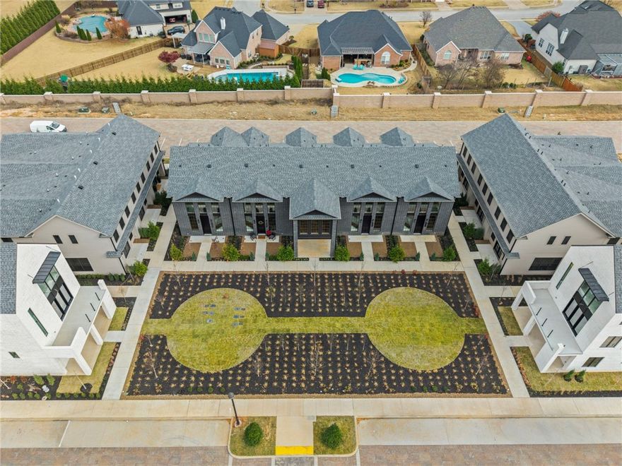 This beautiful home sits in the heart of town, offering an unbeatable location and luxurious living. The new Pinnacle Village Development is just off of Pinnacle Hills Parkway, tucked behind the Walmart Neighborhood Market. Each unit showcases high-end finishes including hardwood floors, 10'ceilings, 8' interior doors, designer lighting and programable thermostat. The open kitchen features quartz counter tops and premium stainless-steel appliances with a gas range. An elevator provides easy access to every level. The bedroom on the bottom level offers complete privacy and can serve as a mother-in-law suite or guest suite. Complete with washer and dryer. The spacious 2-car garage includes an EV outlet. The home is also within walking distance to the Walmart AMP, Topgolf, restaurants, shopping, entertainment and more! Whether you're looking for a personal home or an investment property, this residence offers the best of both worlds.