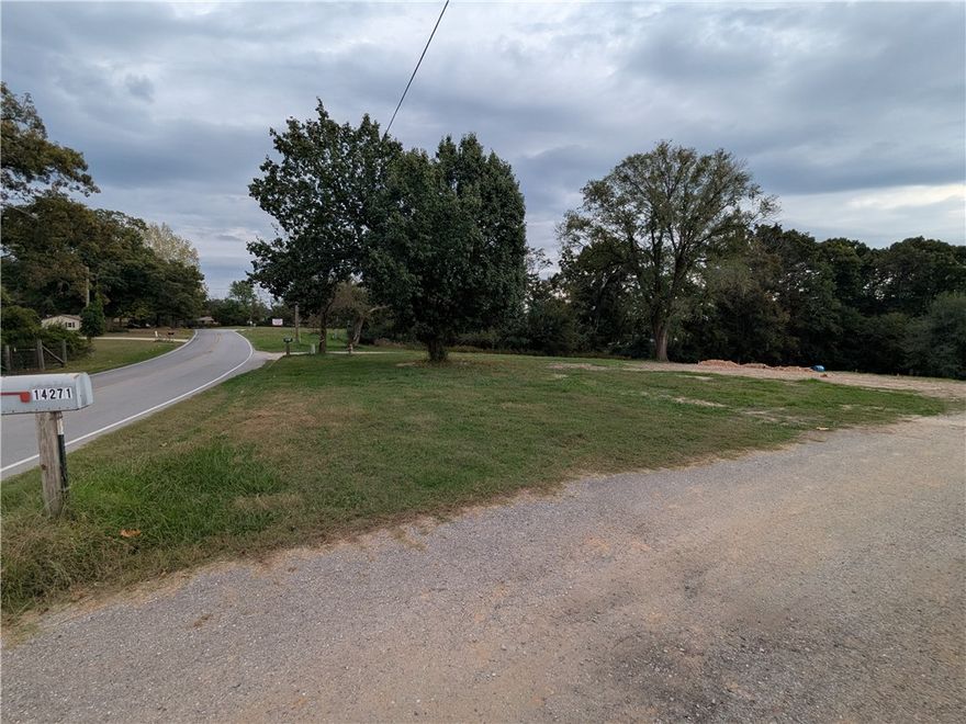 1.5 acres just outside of Rogers downtown. Excellent location with no blind spots pulling out of the driveway. Septic and well already on site and recently inspected. Close to Highway 12 Bridge and boat launch. Lot is recently Cleared and ready to build your dream home.