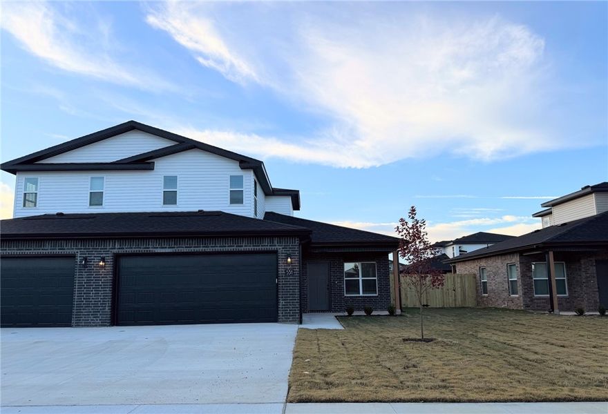 New Construction duplex town-home style offering 3 bedrooms and 2.5 baths in great Centerton location. The main level features LVP flooring throughout, including the primary suite, while the second floor includes upgraded carpet for added comfort. Kitchen comes equipped with a refrigerator, and the home also includes a washer and dryer for added convenience. Enjoy an attached 2-car garage with EV plug, a private patio, and a fenced backyard. Located in a new neighborhood close to area schools, the Walmart Distribution Center, and with quick access to all Centerton and Bentonville amenities. Renters are responsible for all utilities and lawn care.