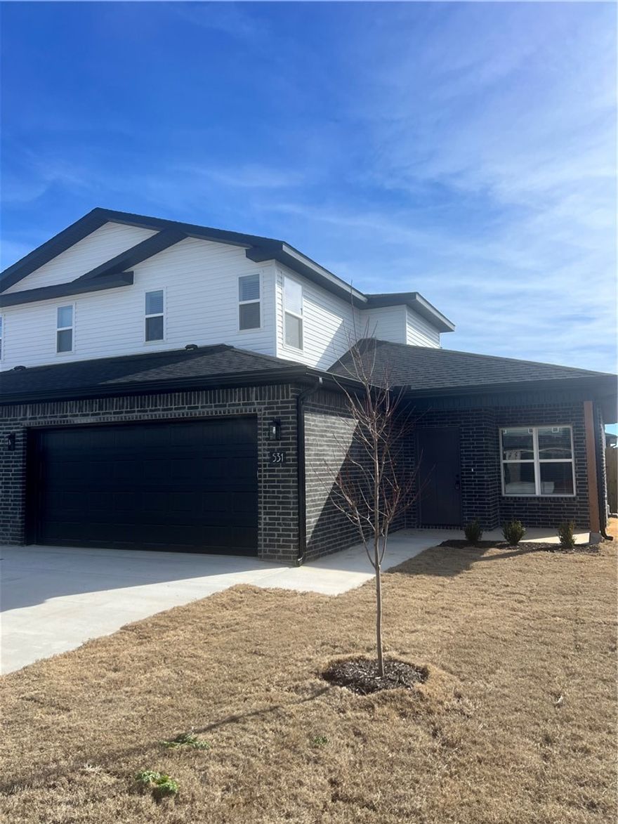 New Construction duplex town-home style offering 3 bedrooms and 2.5 baths in great Centerton location. The main level features LVP flooring throughout, including the primary suite, while the second floor includes upgraded carpet for added comfort. Kitchen comes equipped with a refrigerator, and the home also includes a washer and dryer for added convenience. Enjoy an attached 2-car garage with EV plug, a private patio, and a fenced backyard. Located in a new neighborhood close to area schools, the Walmart Distribution Center, and with quick access to all Centerton and Bentonville amenities. Renters are responsible for all utilities and lawn care.