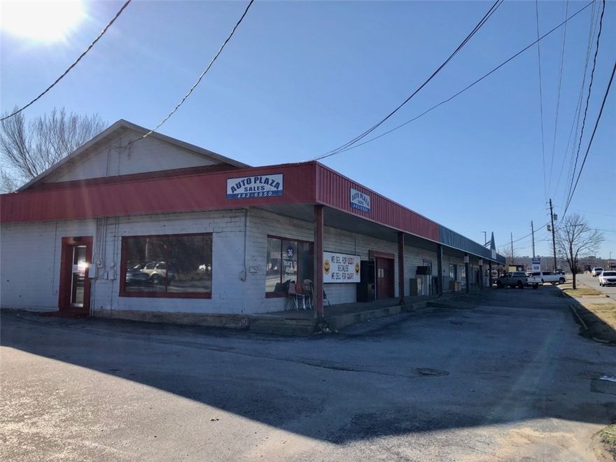 Amazing mid-town location. 2.67 Acres zoned C-2 with almost 400 feet of frontage on College Avenue.  High traffic counts and highly visible location.  Main commercial building has just under 8000 sq feet of space.  Old home in back has over 1800 square feet.  Development potential.