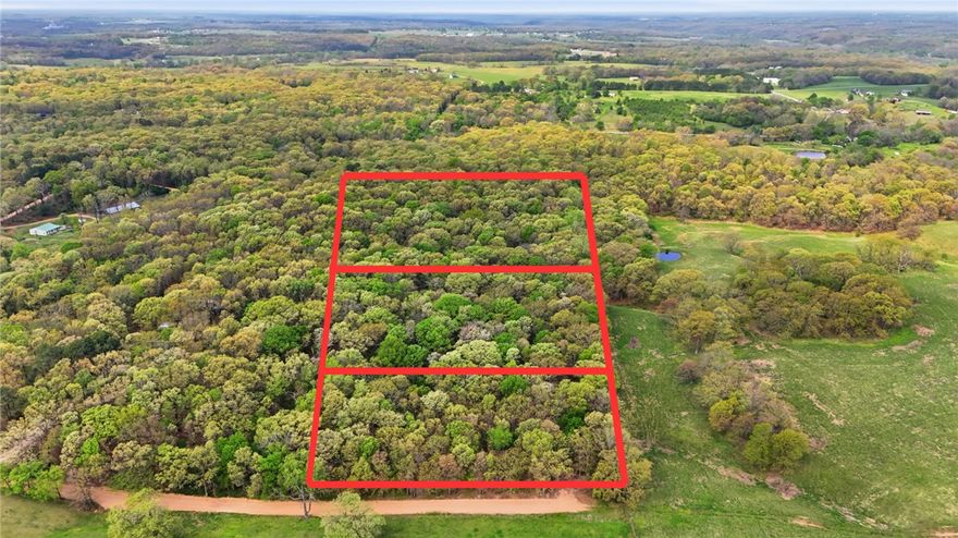 Build your custom estate on this premier 1.42-acre lot located on Hummingbird Lane. This property offers the perfect blend of privacy and accessibility, situated just 10 minutes from I-49, 25 minutes from the Home Office, and only 2 miles from the future North-South Connector corridor.
The land features a mix of level and gently rolling terrain, providing an easy-to-navigate building site. With a 5-bedroom perc test already completed, this lot is ready for your specific architectural vision. Enjoy a secluded atmosphere with the modern conveniences of Gravette, Centerton, Bella Vista, and Bentonville just a short drive away.