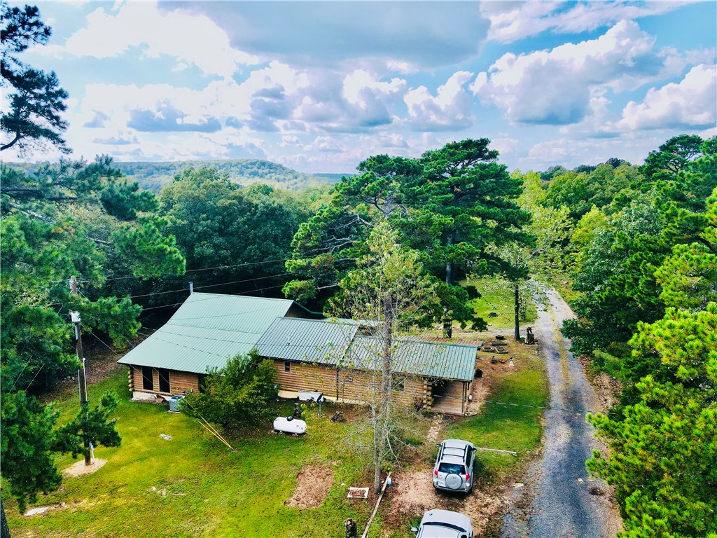 This spacious 2,528 sq. ft. home offers 5 bedrooms, 2 full bathrooms, and a third bathroom that’s nearly complete, making it perfect for a growing family or those who enjoy extra space. Nestled on approximately 13 acres, the property features a peaceful pond, a seasonal creek, a food plot, and abundant wildlife, creating an ideal retreat for nature lovers and outdoor enthusiasts. A 20x20 shop provides plenty of room for storage, hobbies, or projects, adding to the versatility and appeal of this unique country property.