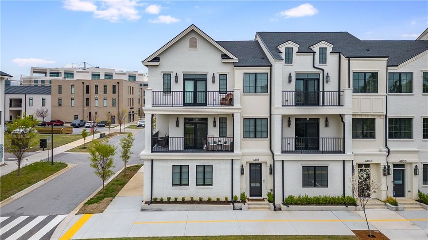 Located on prestigious Champions Drive, this beautifully designed brownstone offers modern urban living in the heart of Pinnacle. One of only three end units that features two private balconies—including a spacious wrap-around terrace—with a total of 260 sq ft of outdoor space. The 2,737 sq ft layout includes three bedrooms and three-and-a-half baths with open-concept living areas filled with natural light. The chef’s kitchen boasts a statement island, premium finishes, and a custom Frigidaire Professional Series column refrigerator and freezer set, built into custom cabinetry with a wine rack. The light-filled primary suite includes a private balcony, generous walk-in closet, and spa-like bath with a wet room and freestanding tub. Thoughtful upgrades throughout include painted interior doors, a tufted wool gray antelope-patterned stair runner, custom linen window treatments, and a Sierra Pacific triple-lock aluminum-clad front door. Located just steps from Pinnacle Heights’ shops, dining, and entertainment.
