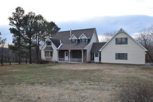 Open floor plan, 4 bedrooms, 2.10 acres, north of town just off Hwy 65. Its a 5 minute drive to Harrison or 20 minutes to Branson. Even more possibilities with the walk-out basement. Each bedroom has a walk-in closet for plenty of storage. The galley kitchen includes a large pantry. Ample attic storage over garage.