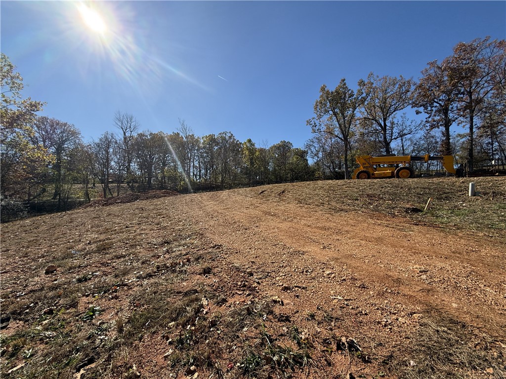 This beautiful building lot in Deerfield Estates, Lot No. 14-A, offers the perfect opportunity to build your dream home in a private subdivision in Harrison, Arkansas. With all utilities available and located in the Harrison School District, this established neighborhood provides a wonderful setting for your new home. Enjoy the convenience of being just minutes away from Harrison's downtown area or take a short 30-minute drive to explore the stunning Buffalo River. Don't miss out on this fantastic opportunity to create your own slice of paradise in this charming community.