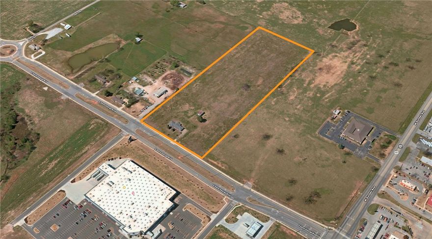 Incredible Development Potential consisting of 15.603 acres located just off the hard corner of Gene George BLVD and Hwy 412 West. 505' of frontage across the street from the new Springdale Sam's club and behind the proposed location for the Springdale Chick-Fil-A. Just down the road from the Children's hospital, Arvest Ballpark, the Washington County NWACC campus under construction and other developments. This is a unique opportunity for a multi-use development.